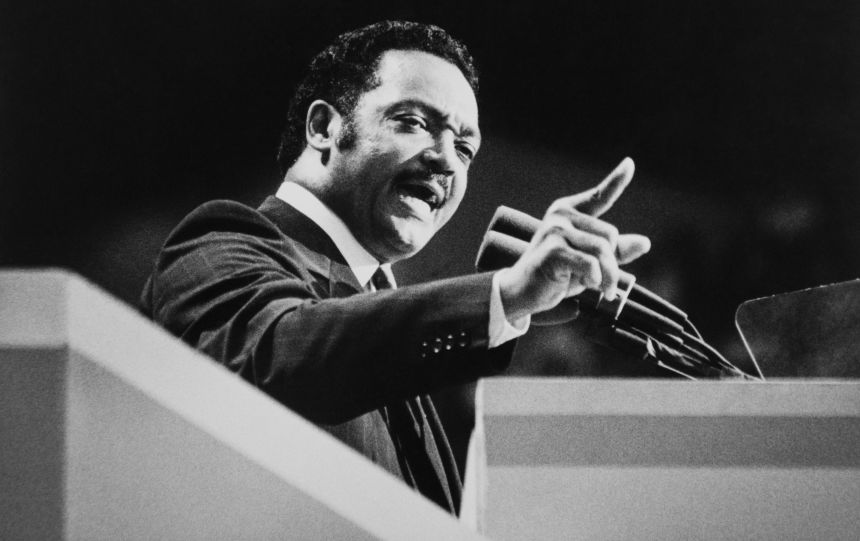 Reverend Jesse Jackson gives a speech during his presidential run in 1988. Andrea Mohin/CQ Roll Call/AP
