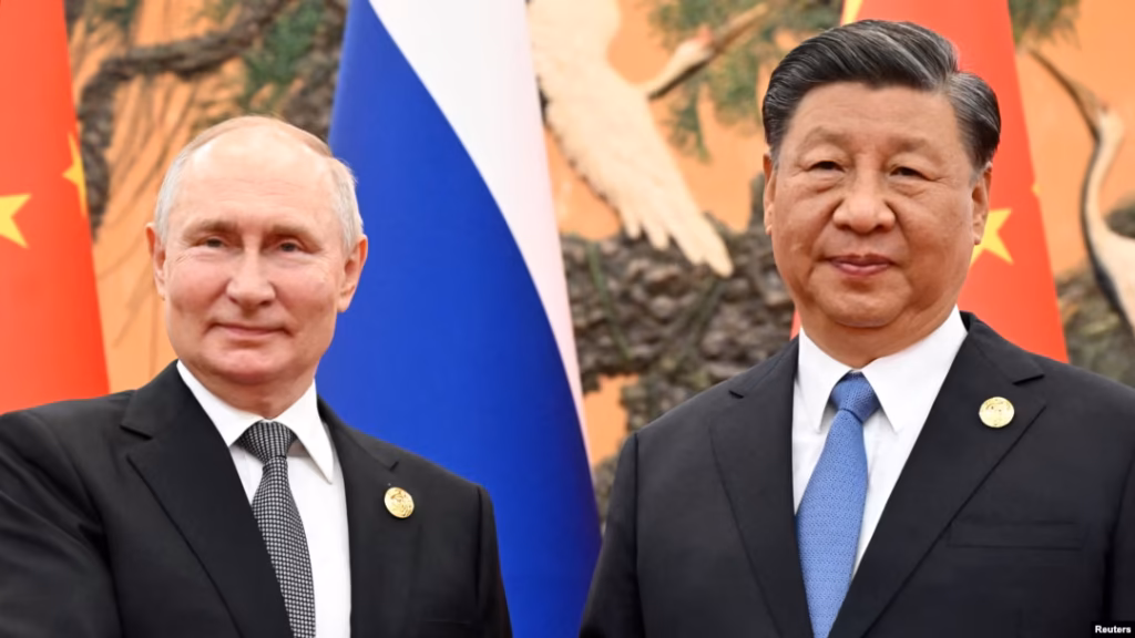 FILE - Russian President Vladimir Putin and Chinese President Xi Jinping pose for a photo during their meeting in Beijing, Oct. 18, 2023. IMAGE: VOA FILE