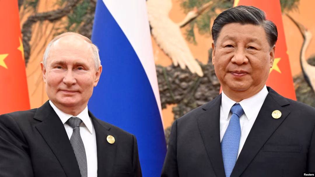 FILE - Russian President Vladimir Putin and Chinese President Xi Jinping pose for a photo during their meeting in Beijing, Oct. 18, 2023. IMAGE: VOA FILE