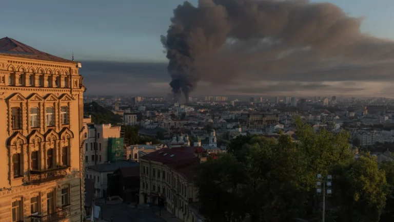 RUSSIA LAUNCHES 'MASSIVE OVERNIGHT PRECISION STRIKE ON UKRAINE' - Smoke rises over the city following a Russian air attack on Kyiv, on July 2, 2026, amid the Russian invasion of Ukraine. Russian missile and drone strikes rocked Kyiv early on July 2, killing two people and wounding more than a dozen, after President Volodymyr Zelensky warned that Moscow was preparing a “massive attack”. (Photo by Roman PILIPEY / AFP via Getty Images)