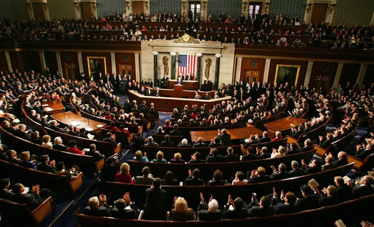 103 CONGRESSIONAL DEMOCRATS VOTED TO STOP AID TO ISRAEL - A joint session of Congress -- with Democrats and Republicans seated on opposite sides of the floor of the U.S. Capitol -- watches as President George W. Bush delivers his State of the Union address on Feb. 2, 2005. - IMAGE: Paul J. Richards, AFP/Getty Images