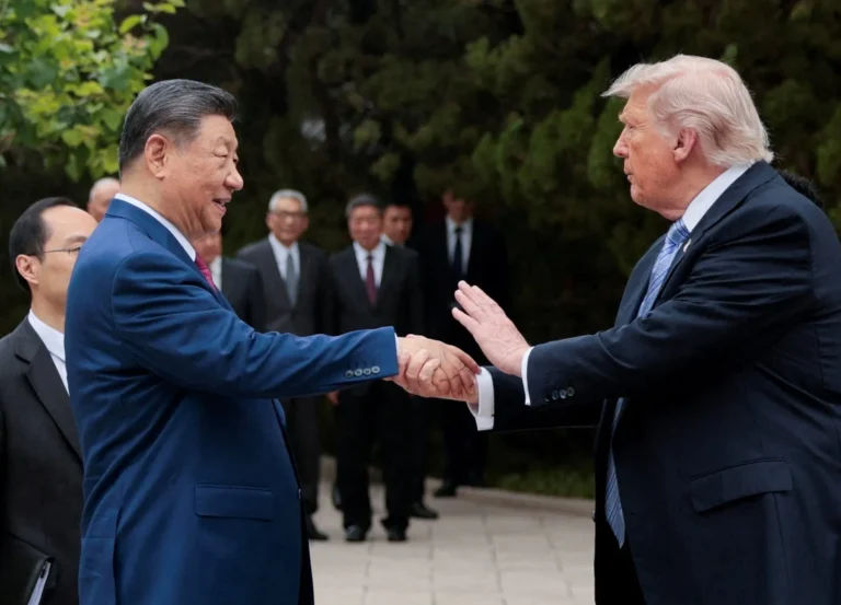 DONALD TRUMP AND XI JINPING SHAKING HANDS - IMAGE: REUTERS VIA AL JAZEERA